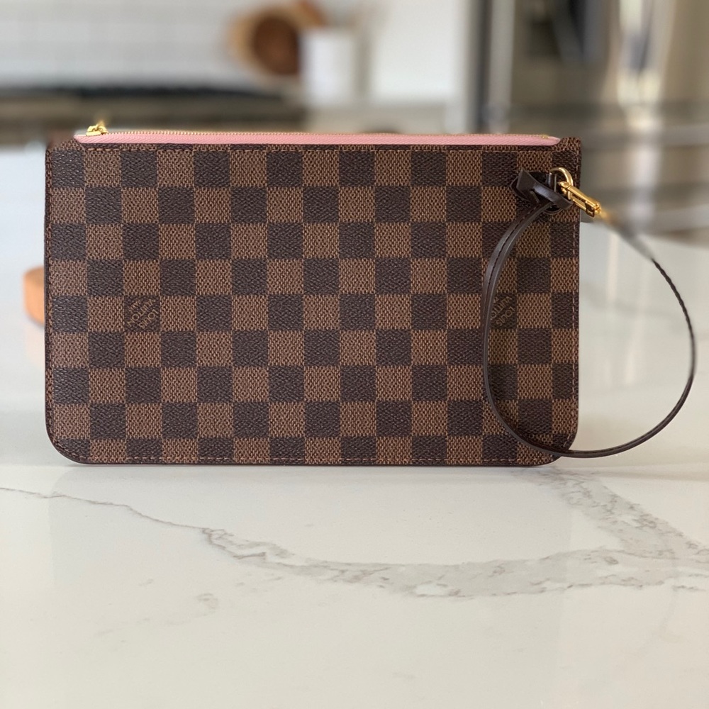 Bought Neverfull at Christmas & never used pouch